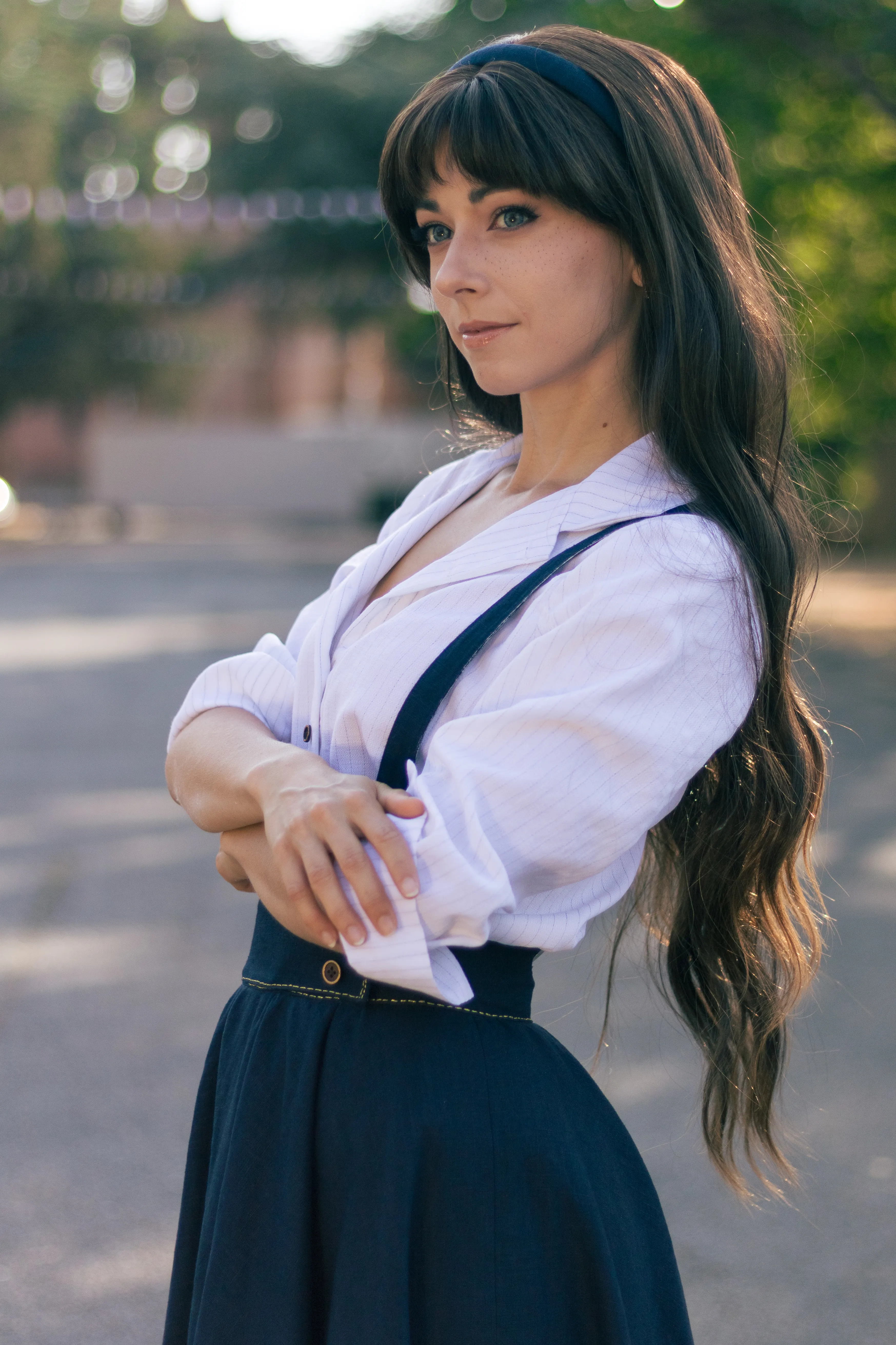Clea Dessendre from Clair Obscur: Expedition 33, arms crossed, white shirt and suspenders, Ryuu Seika cosplay