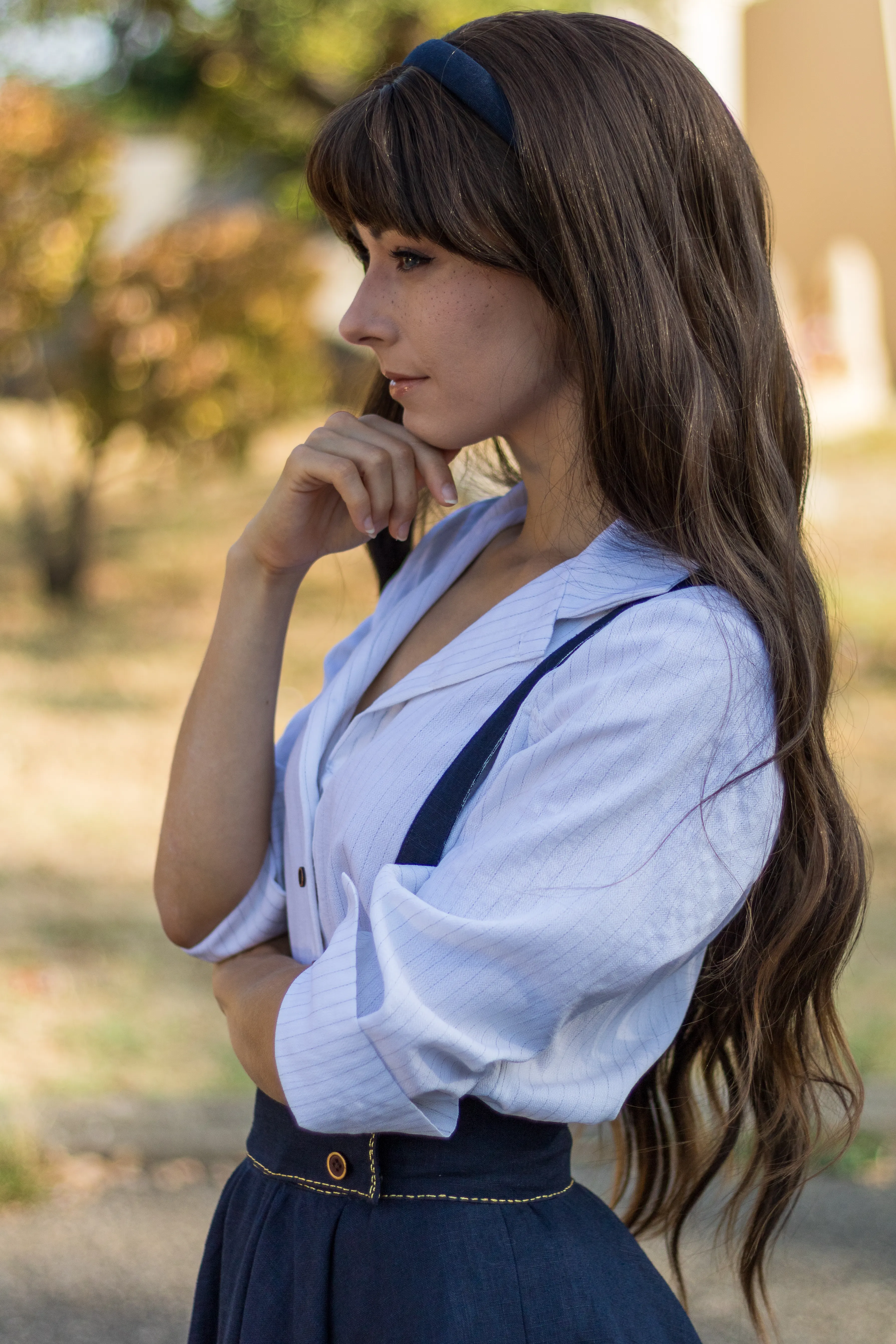 Clea Dessendre from Clair Obscur: Expedition 33, profile portrait, hand near her chin, Ryuu Seika cosplay
