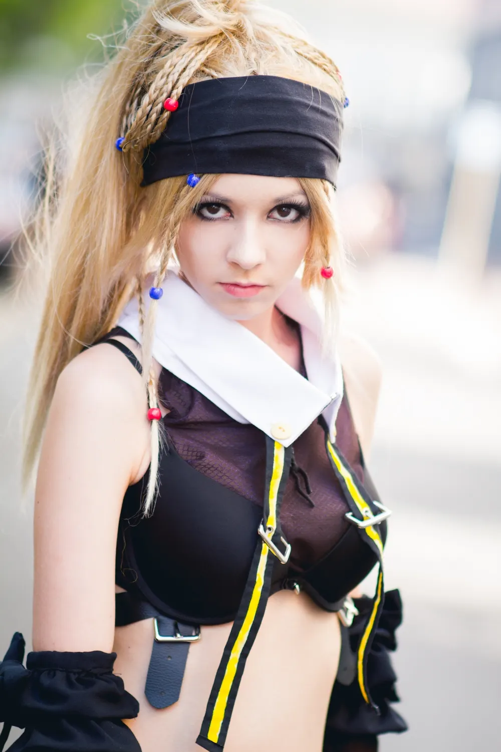 Rikku Ninja in close-up, black headband and red and blue beads in blonde hair, cosplay by Ryuu Seika 2012